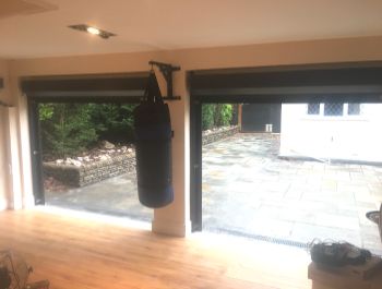 Two insulated roller doors on a home gym garage conversion. 